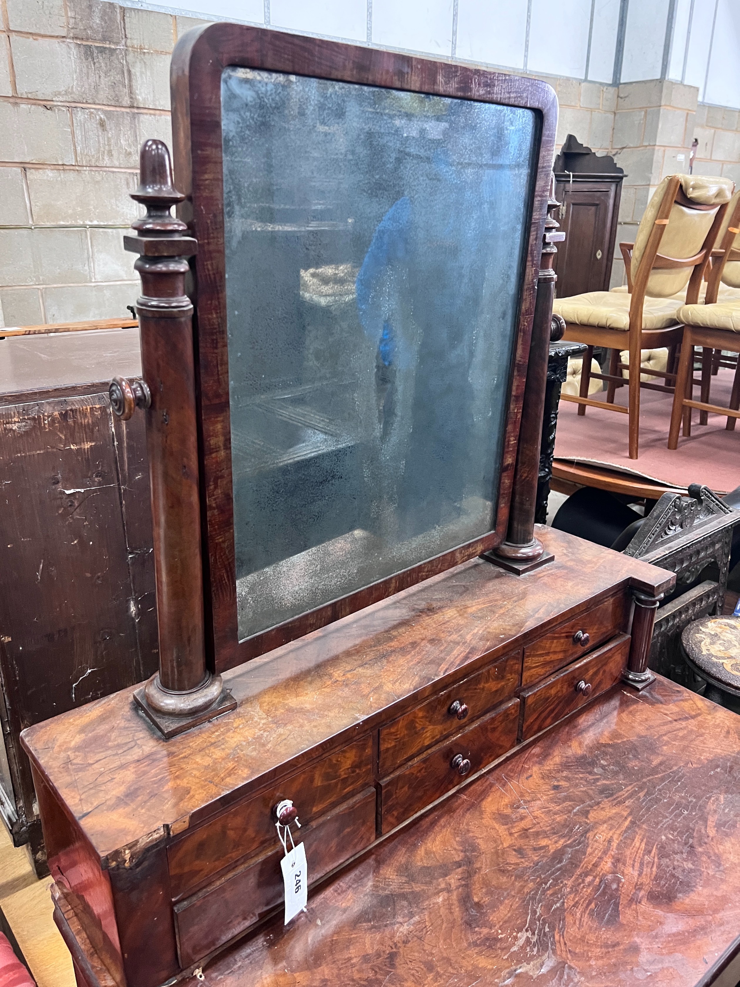 A 19th century French flame mahogany dressing chest, width 90cm *Please note the sale commences at 9am.